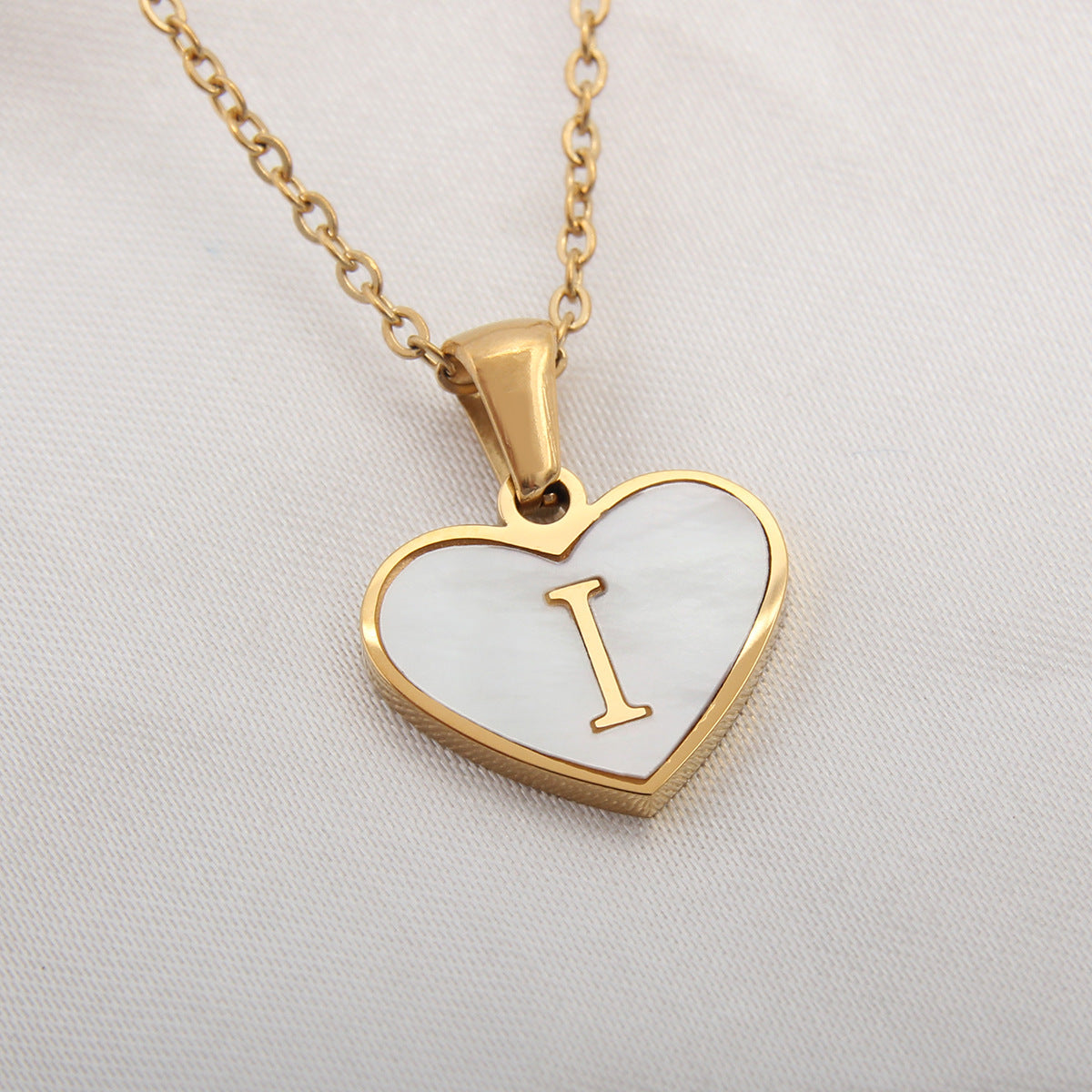 Golden Heartstrings Custom Letter Necklace