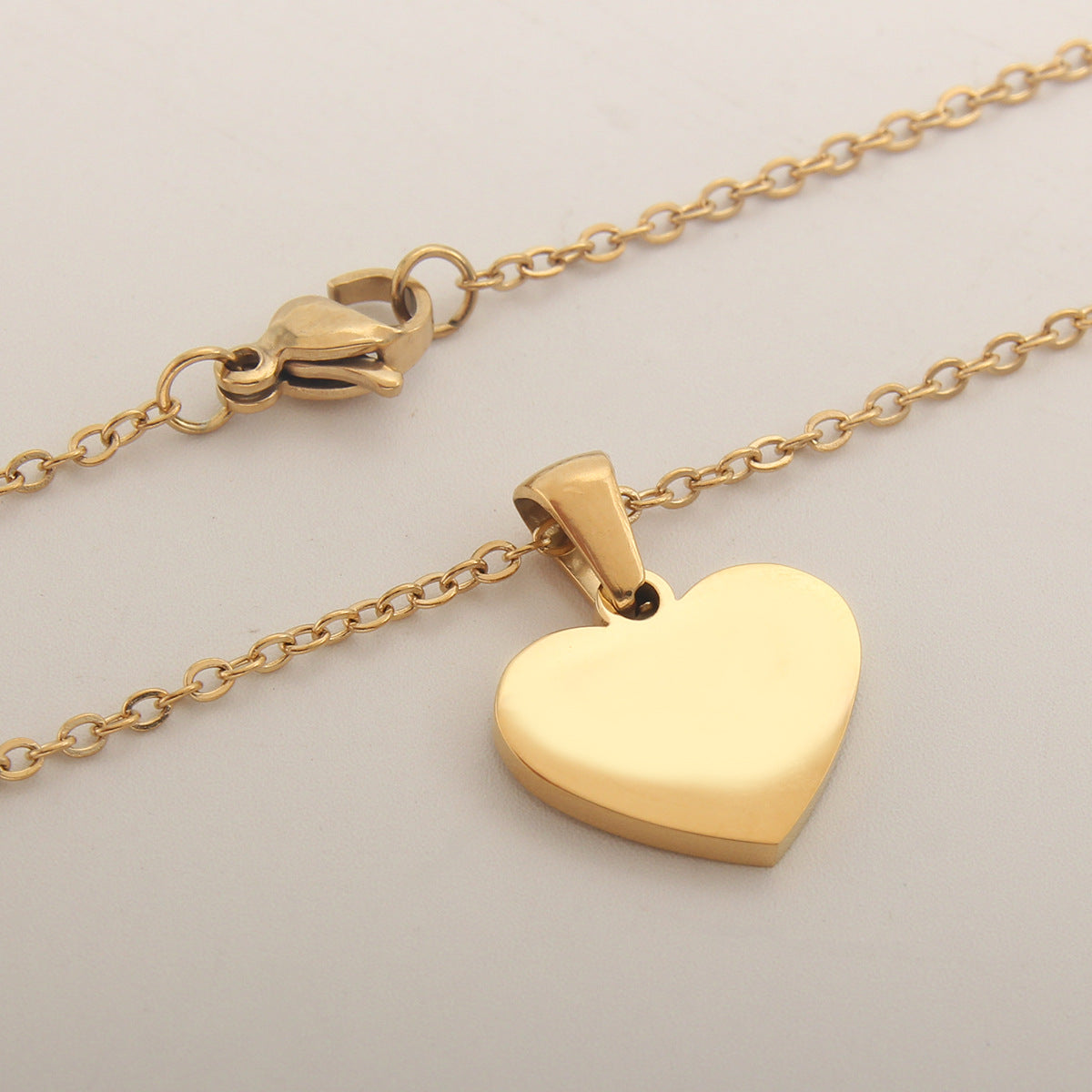 Golden Heartstrings Custom Letter Necklace