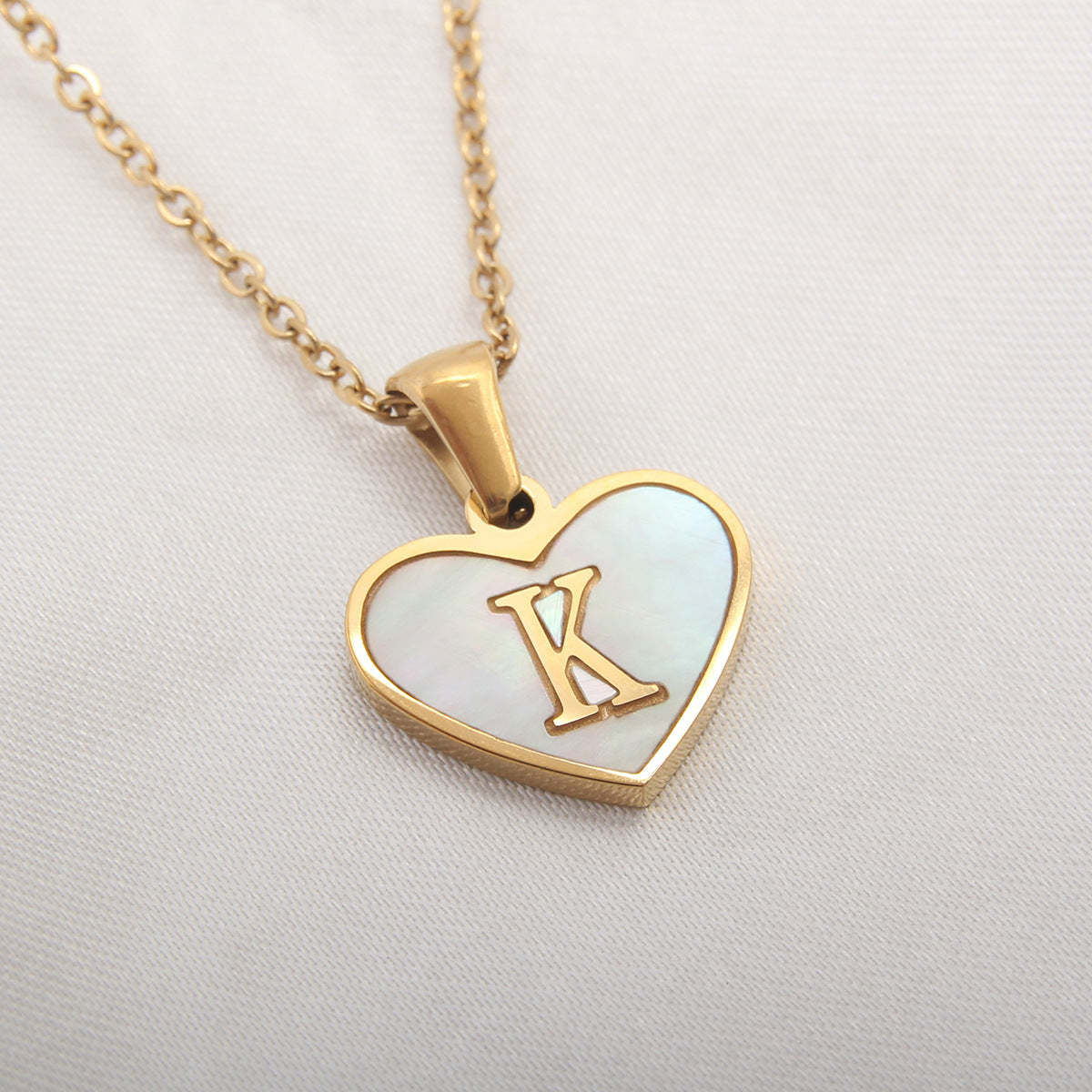 Golden Heartstrings Custom Letter Necklace